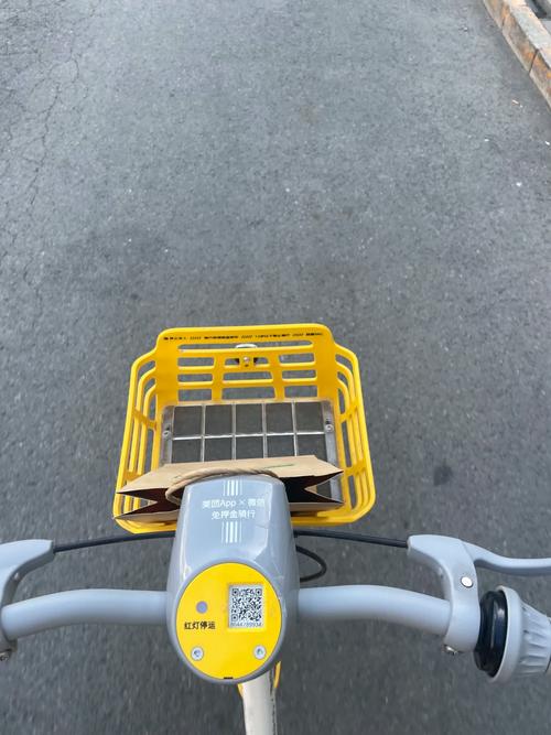 北京小黄车牌号:街头共享单车新地标