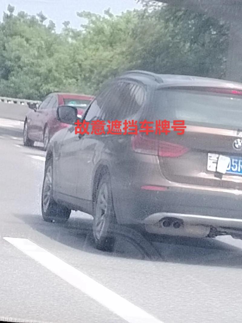 遮挡车牌被罚:故意遮挡车牌扣几分,车主需知!